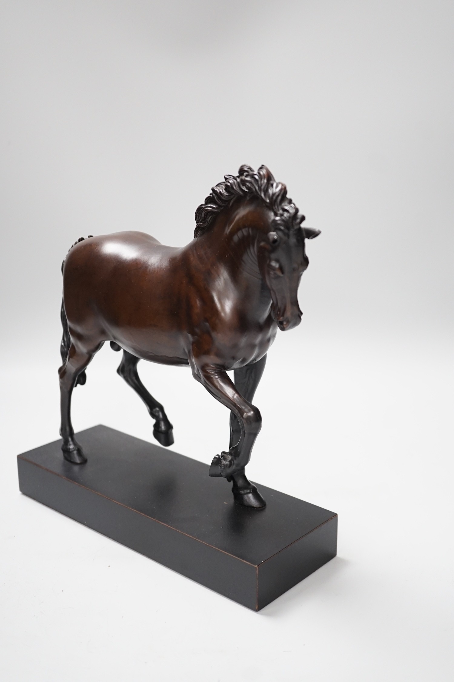 A reproduction bronzed figure of a horse, together with a column desk lamp, 53cm tall excl. light fighting